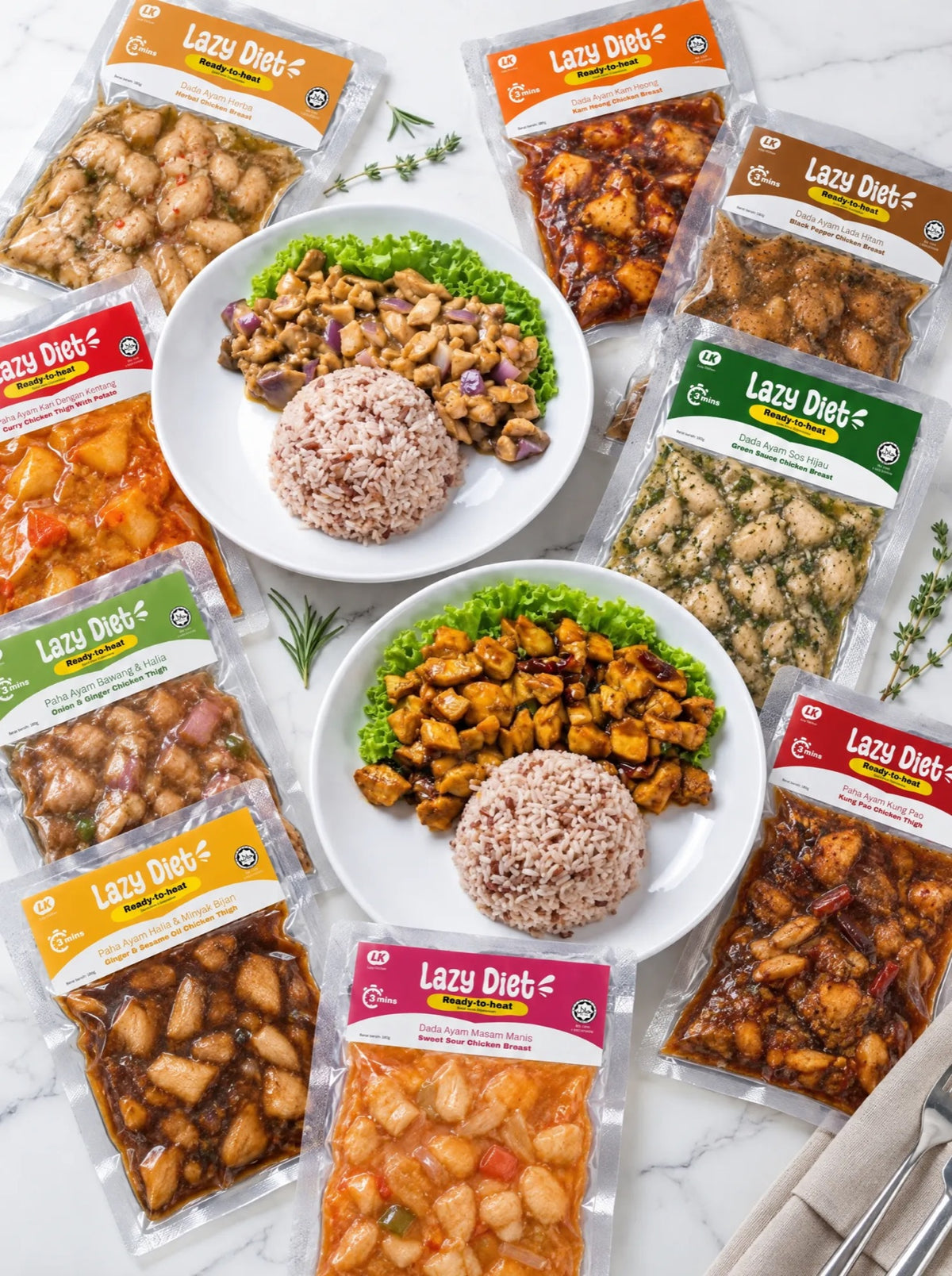 All nine Lazy Diet ready-to-heat packs around two plates of chicken with brown and red rice